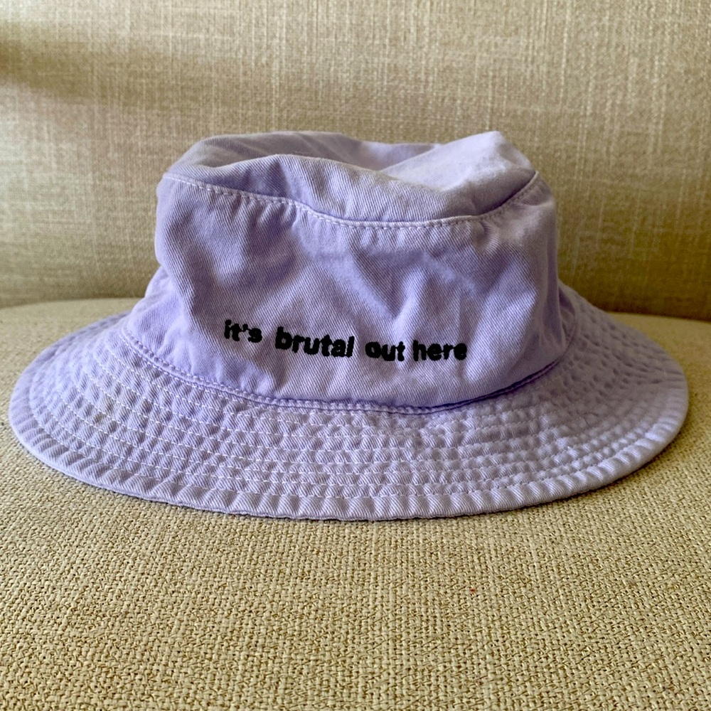 Olivia Rodrigo “it’s brutal out here” lavender bucket hat